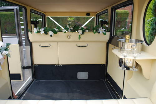 Interior view of our Imperial limousine showing the rear folding seats