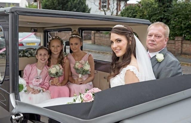 The Bride, Groom and Bridesmaids in our Imperial limousine